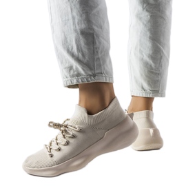Beigefarbene Canvas-Sneaker von Côté