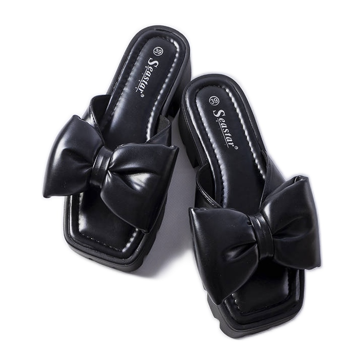 Seastar Schwarze Pantoletten mit Traktorsohle von Bossé