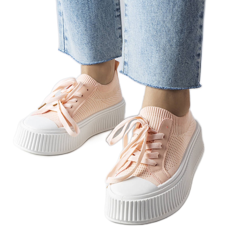 Rosafarbene Stoffsneaker auf der Mallus-Plattform