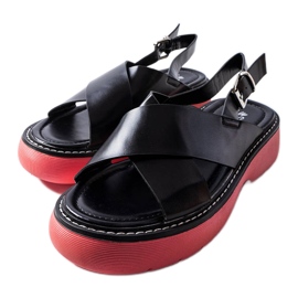 Schwarze Sandalen auf rosa Plateau von Rozana