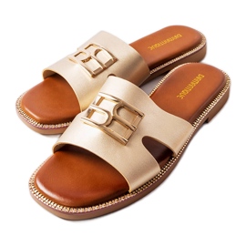 Sabrine goldene Flip-Flops