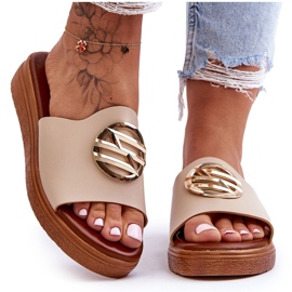 Damensandalen mit beigefarbener Secrets-Dekoration