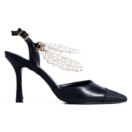 Schwarze Pumps an einer Nadel mit Shelovet-Perlen