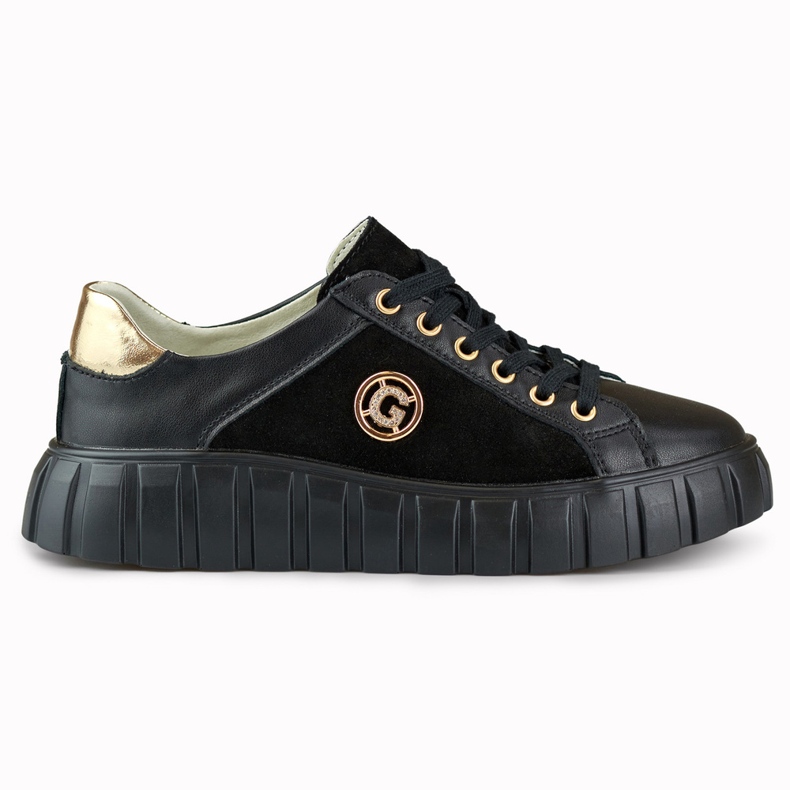 Sportschuhe aus schwarzem Leder mit goldenen Details