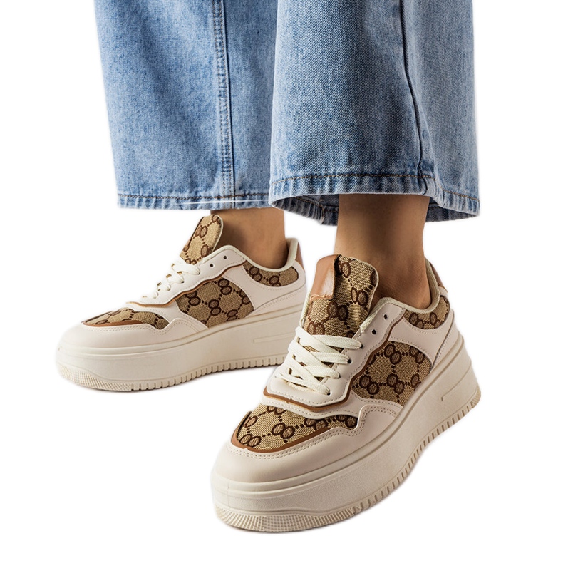 Inna Beigefarbene Sneakers, verziert mit dem Conte-Monogramm