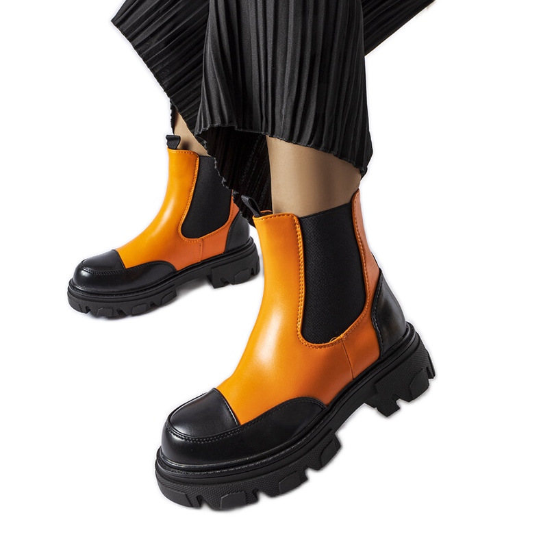 Schwarze und orangefarbene Slip-On-Stiefel von Albany