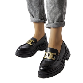 Schwarze Slipper, verziert mit einer Schlanders-Schnalle