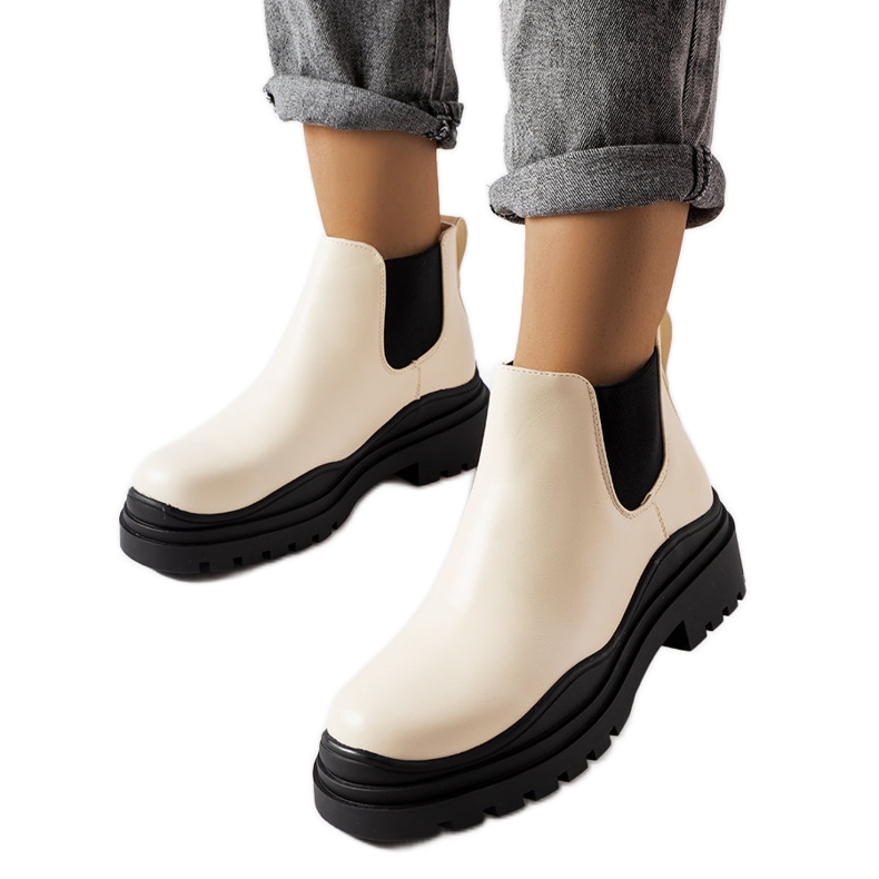 Beige Stiefeletten auf schwarzem Plateau von Marinone