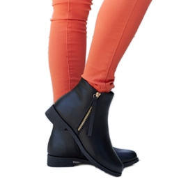 Schwarze isolierte flache Stiefeletten von Paien