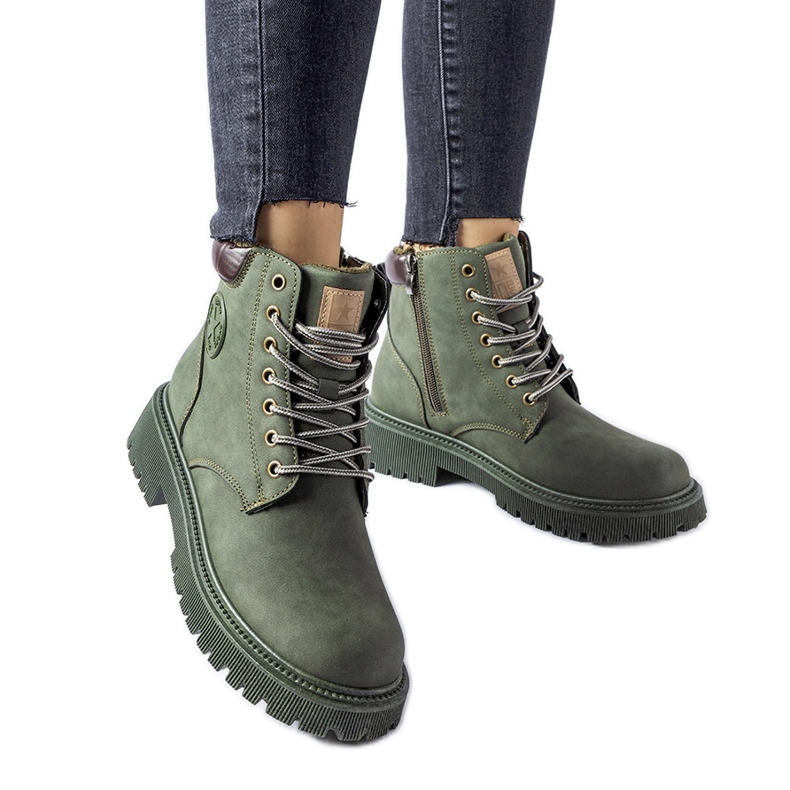 Grüne isolierte Doutor-Stiefel