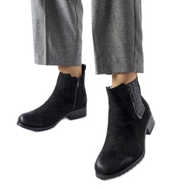 Schwarze flache Stiefeletten mit dekorativem Arnoux-Einsatz