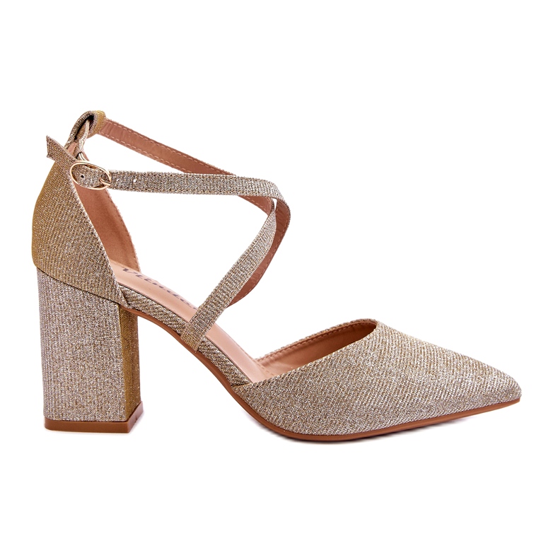 Modische glänzende goldene High-Heel-Pumps