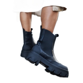 Schwarze Stiefeletten mit sichtbarem Moriano-Profil