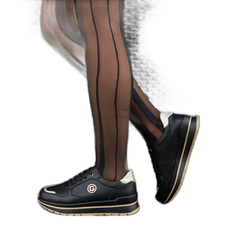 Schwarze Lederschuhe mit Strasssteinen