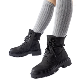 Schwarze flache Stiefel mit Brattle-Schutz