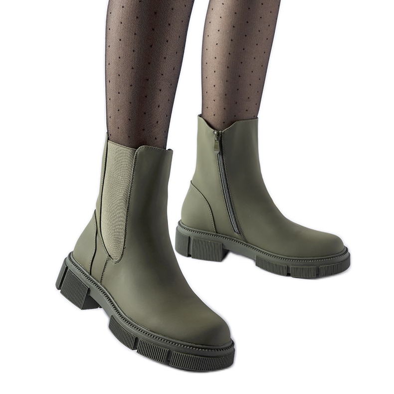 Grüne isolierte Sorbo-Gummistiefeletten