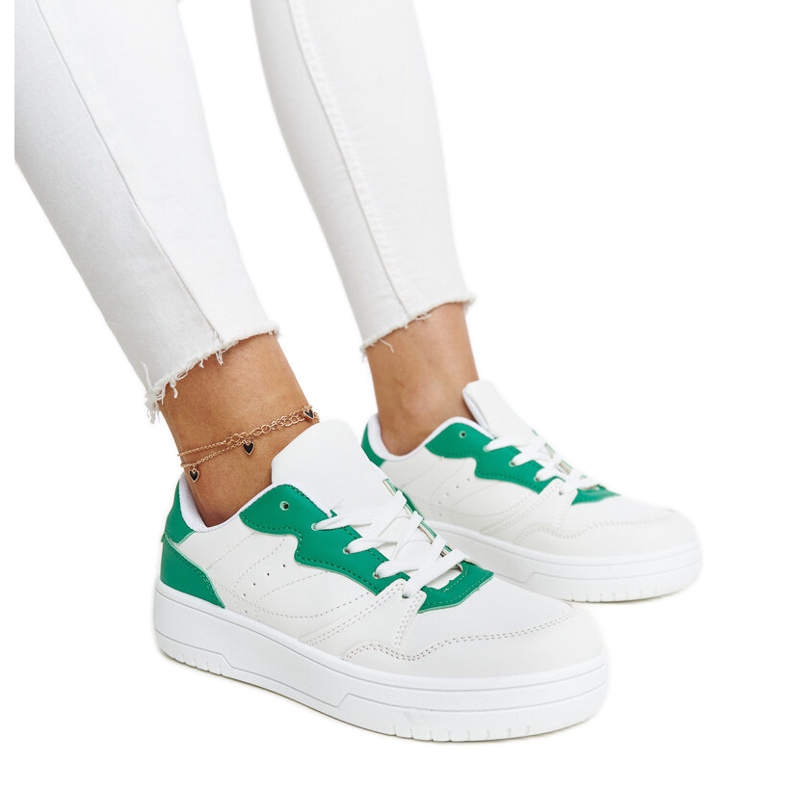 Weiße Turnschuhe mit grünem Fournie-Akzent