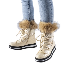 Beige Lack-Schneestiefel mit Schleifenfell