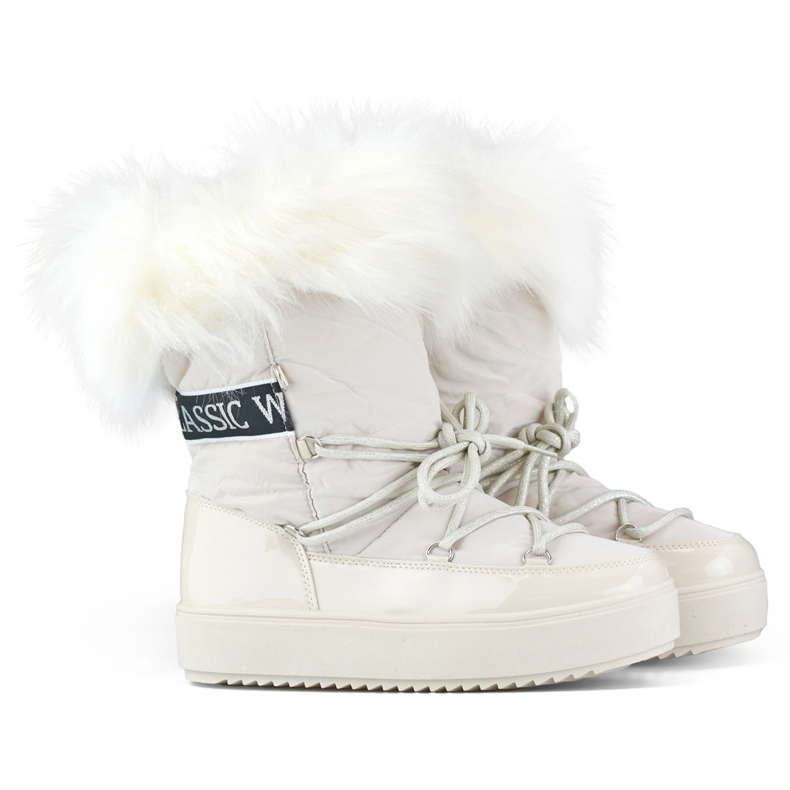 Hohe beige isolierte Damen-Schneestiefel mit Fell