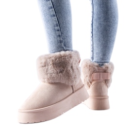 Rosa Schneestiefel mit Adelfia-Fell verziert