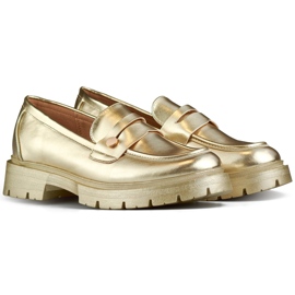 Goldene Damenschuhe mit dicker Sohle