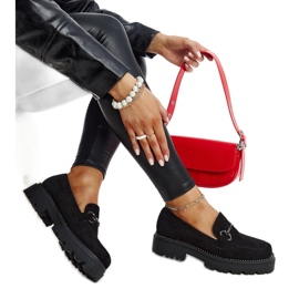 Schwarze Lederschuhe mit dekorativer Schnalle