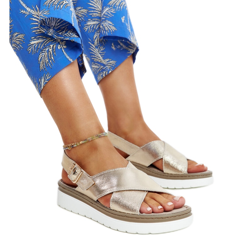 Goldene Ithar-Plateausandalen aus Leder