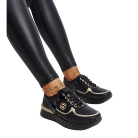 Schwarze Lederschuhe mit dekorativer Schnalle