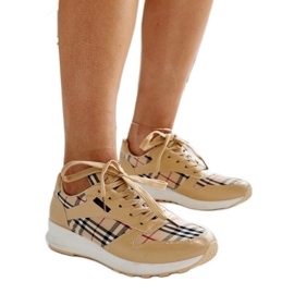 Beige Lederschuhe mit dekorativer Schnalle
