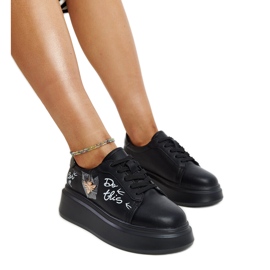 Schwarze Lederschuhe mit dekorativer Schnalle