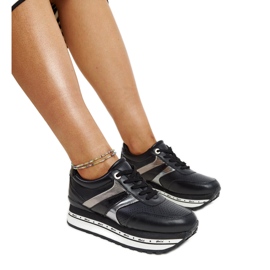 Schwarze Lederschuhe mit dekorativer Schnalle