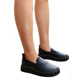 Schwarze Schuhe mit massiver Teska-Sohle