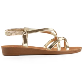 Goldene Damensandalen mit flacher Sohle