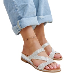 Silberne Flip-Flops mit niedrigem Keilabsatz von Asker