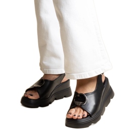 Schwarze Bayley-Keilsandalen mit Schnalle