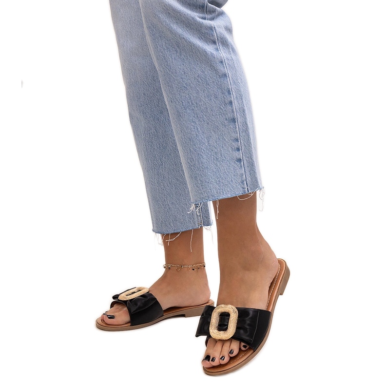 Schwarze Flip-Flops mit Limera-Schnalle