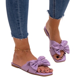 Lila Flip-Flops mit dekorativer Schleife von Uwansa