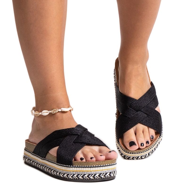 Schwarze Flip-Flops mit dekorativer Demet-Sohle