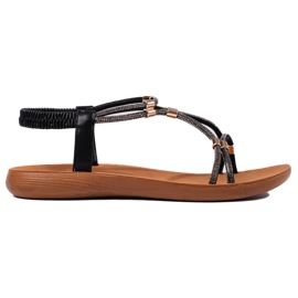 Schwarze flache Glitzersandalen