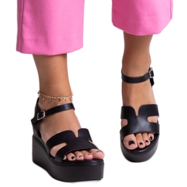 Reema schwarze Keilsandalen