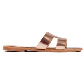 Klassische goldene Flip-Flops für Damen