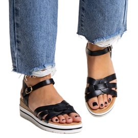 Schwarze Hikma-Sandalen mit niedrigem Keilabsatz