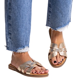 Goldene klassische Flip-Flops mit Umayma-Dekoration