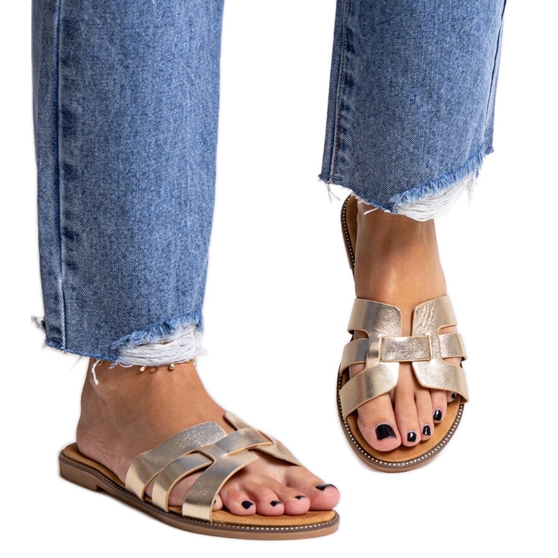 Goldene klassische Flip-Flops mit Umayma-Dekoration
