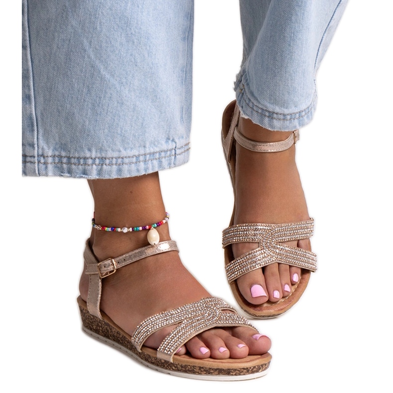 Saila Champagner-Sandalen mit niedrigem Keilabsatz golden