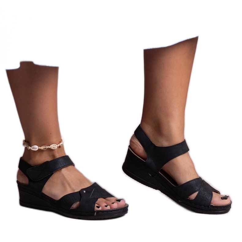 Schwarze Kirane-Sandalen mit niedrigem Keilabsatz