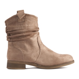 Stiefeletten aus beigem Wildleder mit Falten