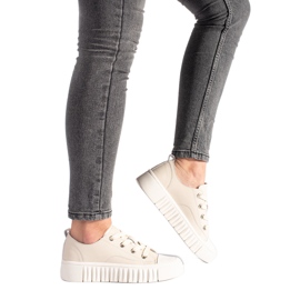 Damensneaker aus beigem Leder