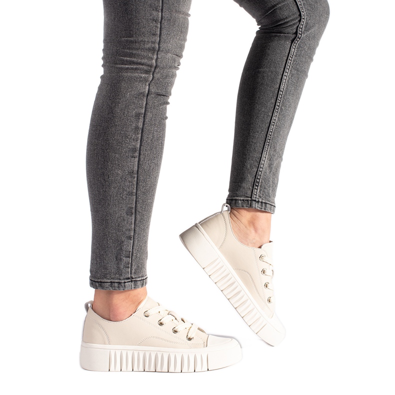 Damensneaker aus beigem Leder