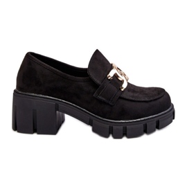 Damenschuhe mit hohen Absätzen und schwarzer Verzierung